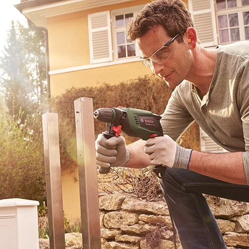 Дрель ударная Bosch UniversalImpact 700 (набор сверл и бит 39 шт.) (060313100A)